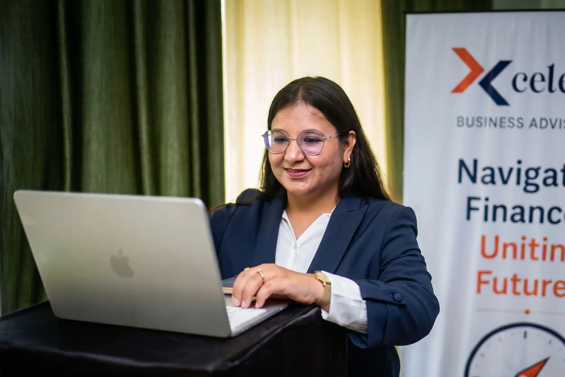 An Xcelerate Advisory team member at her workstation